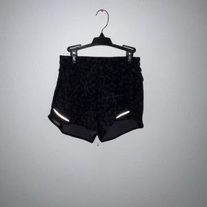 black cheetah print lululemon hotty hot shorts 4”